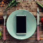 mobile phone on dinner plate